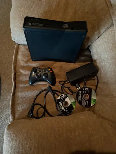 Xbox 360 + controller + 2 games, View more