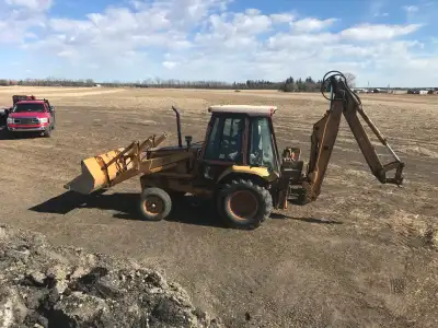 Case 580k Entendahoe 24 inch digging bucket Front buck had new cutting edge recently put on Tires ar...