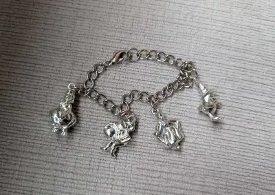 Silver Four Charm Bracelet, View more