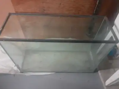 12" w x24" h x36" w tank. Nice profile. Accessories include pump, heater, filter, UV filter and some...
