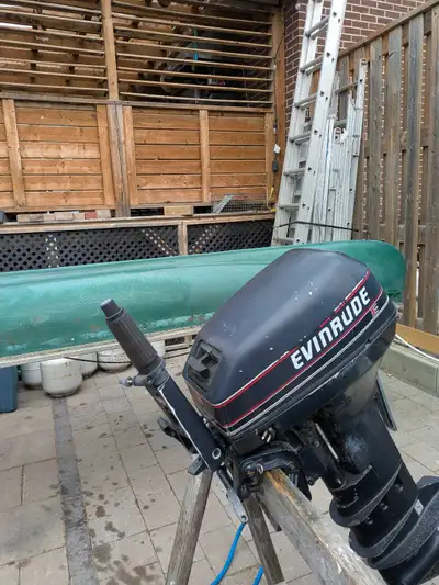 1999 evinrude long shaft outboard....tank and hose included.... please call or text 905 213 7557......