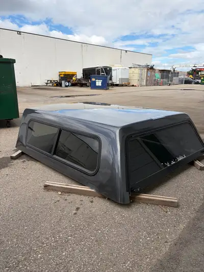 Selling my dark grey fiberglass truck topper. It came off a 2019 f150 but will fit any 1/2 ton truck...