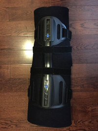 Knee/leg brace. 26 inches long. Adjustable with velcro straps.