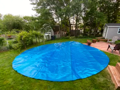 Looks brand new and never used. 21 foot solar blanket for round pool Space age silver backing