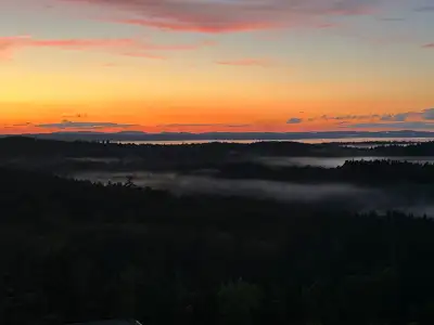 House sitting on a hill with the best overlooking view on Deer Island. You get a sunrise and sunset...