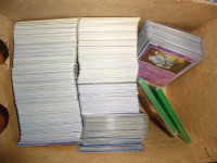over 800 pokemon cards in new condition