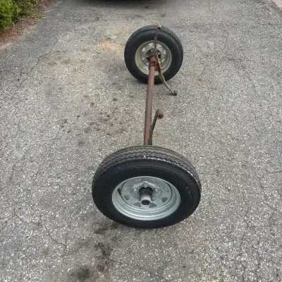 Used for only 10 trips. Manufactured less than a year ago by Highland Trailer. Spindles have grease...