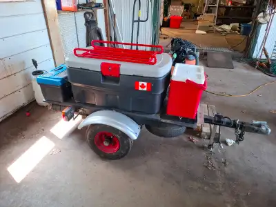 Motorcycle Trailer selfmade. Strong build. Has an sparetire. On the bottom 2 black tubes with lids f...