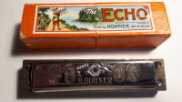 Harmonica echo bell metal reeds