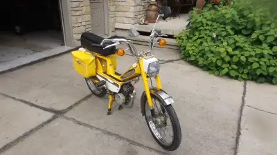 1975 Moped in excellent condition. 50cc two stroke engine with pedals. This bike has been originally...