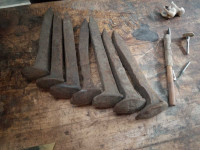 7 railroad tie spikes