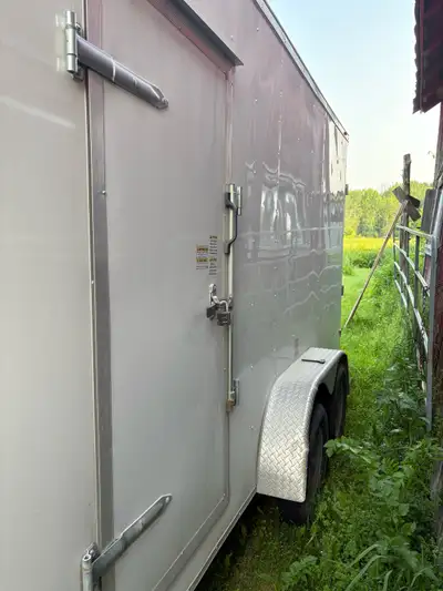 Very nice 2023 sled/atv trailer perfect shap , 22 feet long 3 doors 1 ramp door at back of trailer a...