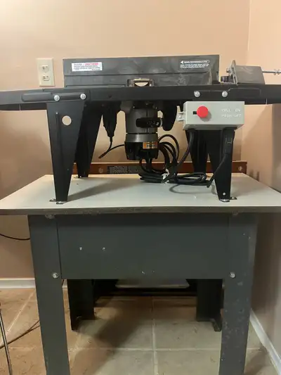 This is a Craftsman router table, perfect for any woodworking shop. It's in good condition and ready...