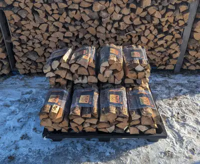 Clean seasoned firewood bundles with quality wood that is always stored off the ground for $7/each a...