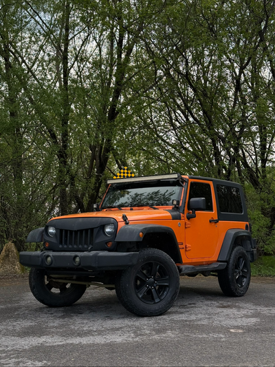 Jeep Wrangler Sport 2012, 2 portes, moteur 3.6L V6 Pentastar, transmission manuelle. 171 386 km. Le...