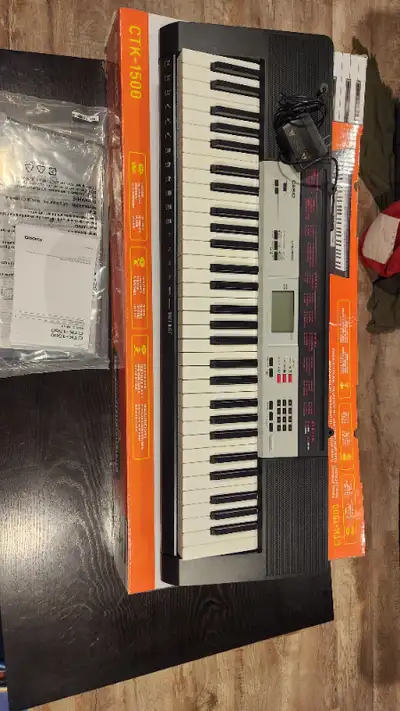 Casio TK-1500 61 key keyboard for $150.00 or $160.00 delivered in the London/kw area. Comes with man...