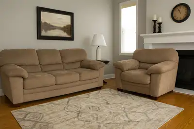 Free delivery* Excellent condition couch and oversized chair set Very comfortable both couch and cha...