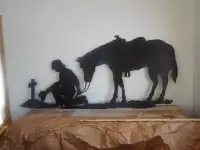 PRAYING COWBOY WITH HORSE