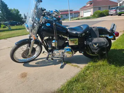 97 Harley 1200cc xl sportster for sale Drives runs great asking $5000 OBOcall or text 780 996 7120