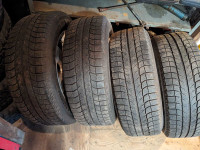 Four Michelin Latitude 245/60R18 Xice Studless Tires. 