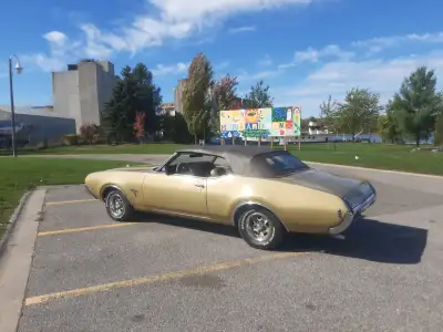 Looking to trade for a 69 Cutlass hardtop, Console and bucket car. Must have nice body and paint. 69...