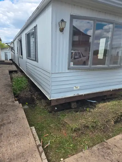 For only $1.00 you can have a 16 x 68 Mobile home. Sold as is. Buyer is responsible to move located...