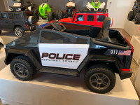12V Police Car Ride On w/ Rubber Wheels, 4x4, Bluetooth & Remote