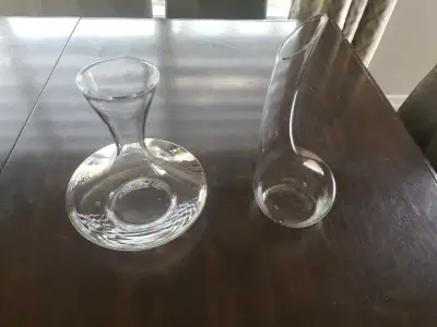 Two glass decanters, View more