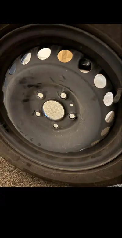 Selling a set of Michelin winter tires (size: 195/65 R15) mounted on rims. These were used only once...