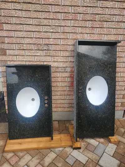 Selling 2 granite vanity tops each top comes with faucet. - 22" x 37" ...150$ - 22" x 49" ...200$