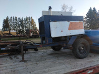 Gas powered portable arc welder/ generator with trailer stick