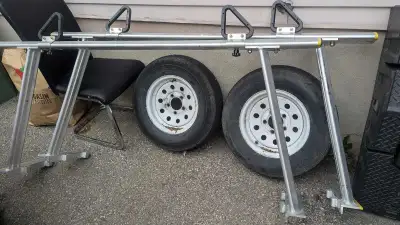 Adjustable rack that can fit in most truck bed and trailer. Hardware included Missing some plastic e...