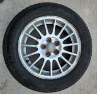 Four almost new tires on Chrysler alloy rims