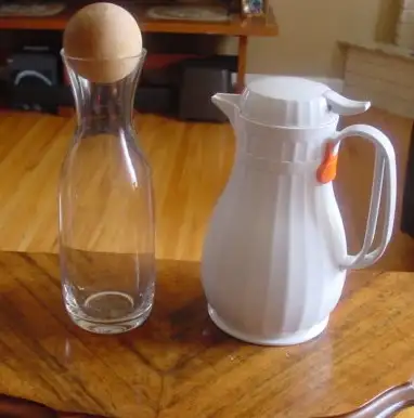 two carafes 1 wine/beverage the other hot/cold bev, both NEW, View more