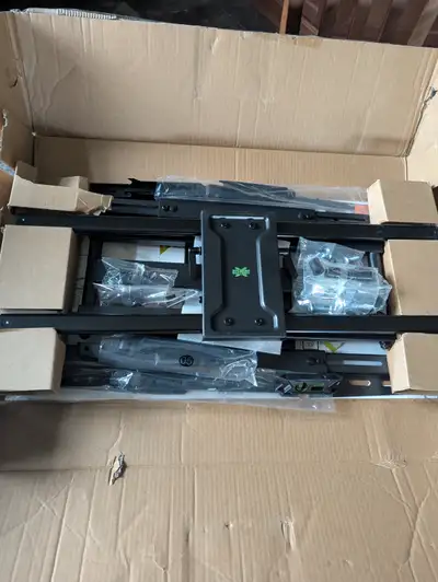 Brand new heavy duty TV wall mount. USX-MOUNT XML018-15. AMAZON PRICE $129.99+TAX.