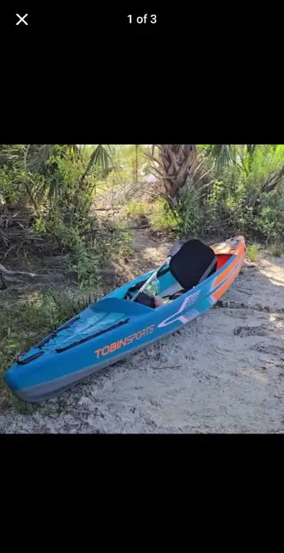 Brand New never used inflatable kayak Sells at Costco for $399 Comes with pump, paddle, two fins, ni...
