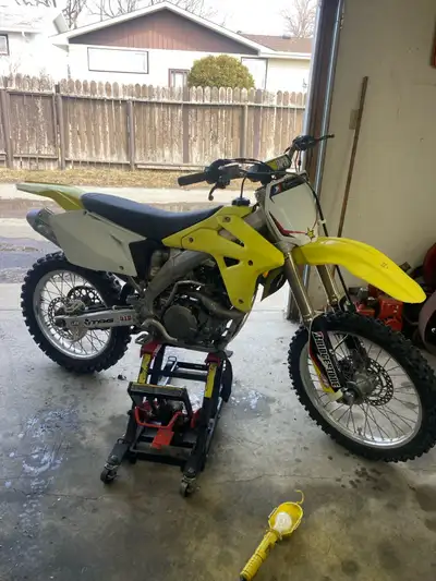 2005 rmz 450 recent piston runs good not available till weekend break away levers aftermarket exhaus...