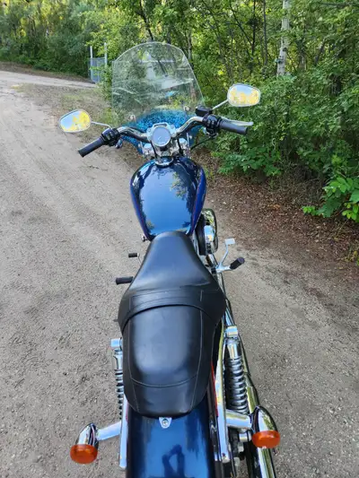 Beautiful ,lo and easy to handle. Security system, battery tender Memphis Shades windshield.