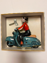 Vintage toy / scooter girl