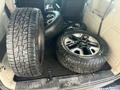 Selling my jeep rims and tires bolt pattern is 5x110 they are 17"rims the tires are falken wild peak...