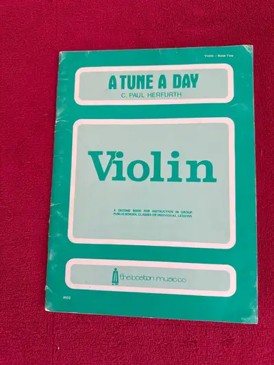 Dive into musical learning with A Tune a Day, Violin Book Two, a comprehensive guide for violin stud...