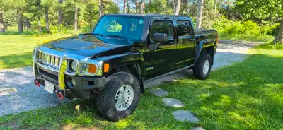 2009 Hummer H3T 4x4 truck with 3.7 inline 5 and a 5 speed manual. Truck is super rare and drives lik...