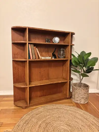 Beautiful solid Tiger oak rounded bookcase. Looks to be of commercial grade and style. Lovely displa...
