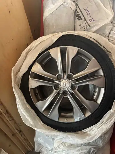Sailun Ice Blazer WSTX Winter Tires and Alloy rims from 2018 Hyundai Elantra. Size 215 45R17. 9mm tr...