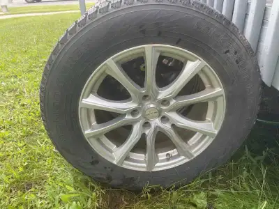 4 235/65/17 tires on aluminum wheels. Wheels are 5x114.3 bolt pattern with a 67.1 center bore with a...