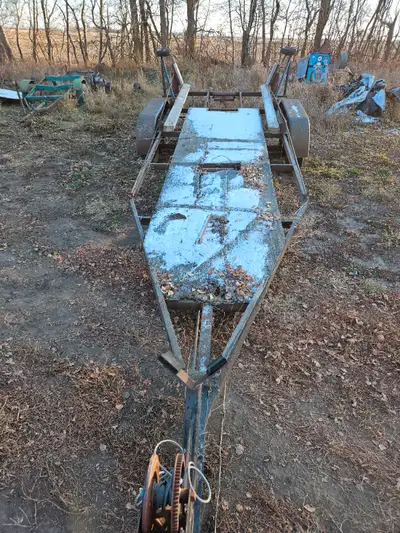 Vintage 24 foot boat trailer. Measures 79" between the fenders and 101" to the outside of the tires....