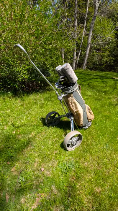 Golf clubs an bagboy pull cart, View more