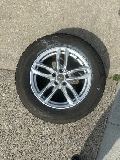 Set of 4 bridgestone tires with fancy rims Tire size :- 225/65R17