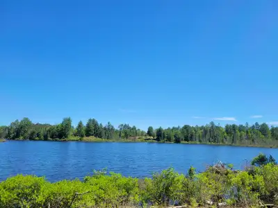 • Large 4-acre Waterfront Lot. • $140,000 for the 4-acre waterfront lot • 143 chemin du Lac Weller •...