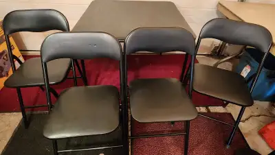 Black Folding Card Table and 4 Folding Chairs Table is 34in x 34in x 28in Tall